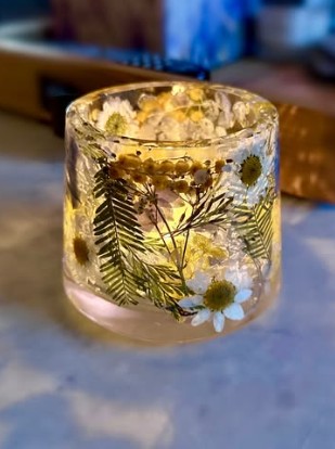 Pressed flower candle holder glowing